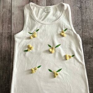 White Tank Top with Yellow Pom Pom Embellishments